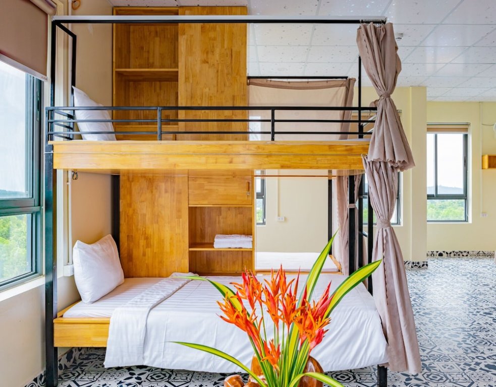 Кровать в общем номере The Landing Resort Phu Quoc
