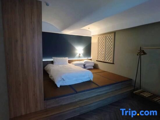 Cama en dormitorio compartido Grand Cozy Hotel