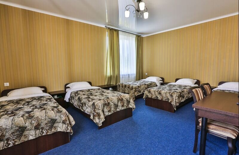 Кровать в общем номере Гостиница Сильвер
