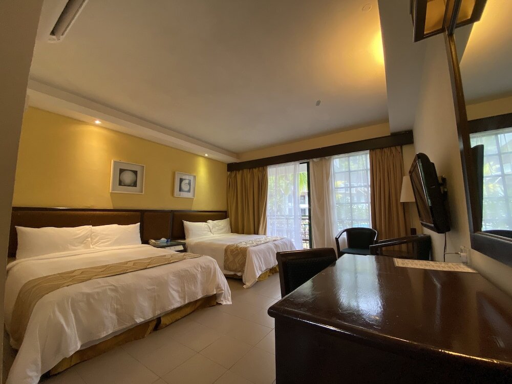 Deluxe quadruple chambre avec balcon Residence Inn Cherating