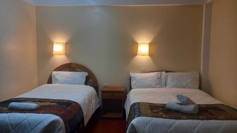 Deluxe quadruple chambre Cuzco Plaza Inn