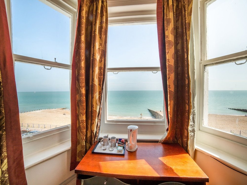 Standard Triple room with sea view OYO The Strand Hotel