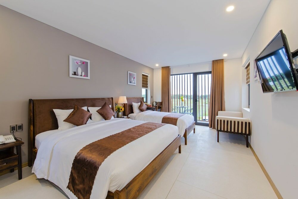 Standard famille chambre avec balcon Sun Paradise Villa Hoi An