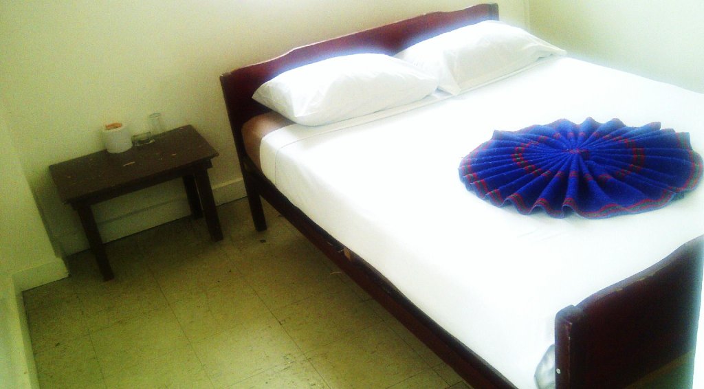 Кровать в общем номере City Private Hotel