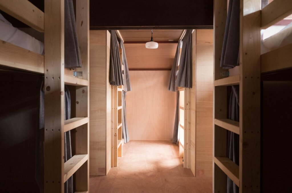 Cama en dormitorio compartido Shirakawago Guest House Kei