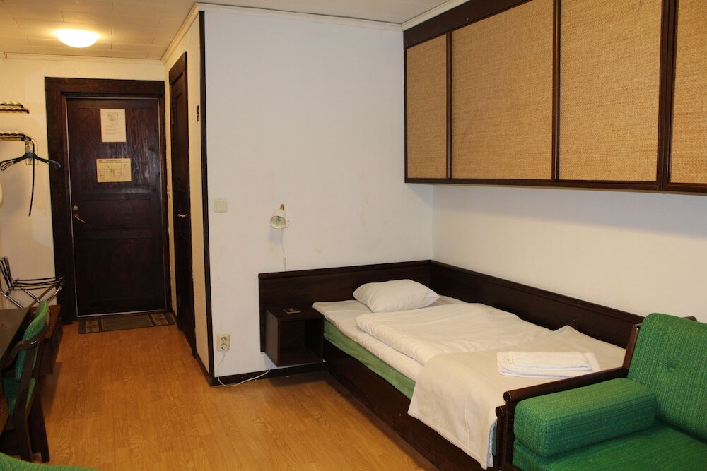 Economy Quadruple room Hotell Amigo