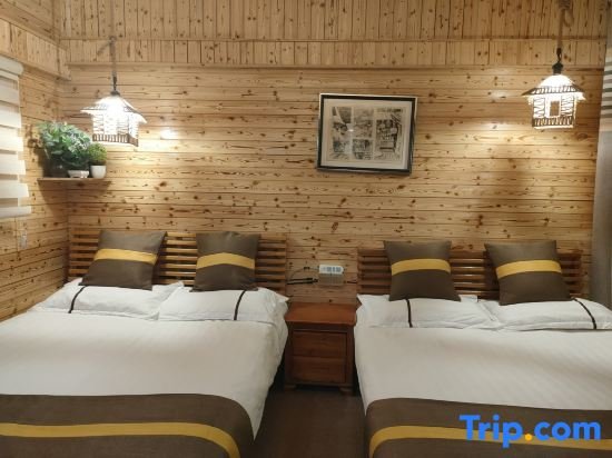Кровать в общем номере Nanjing Tulou Qingdelou Inn