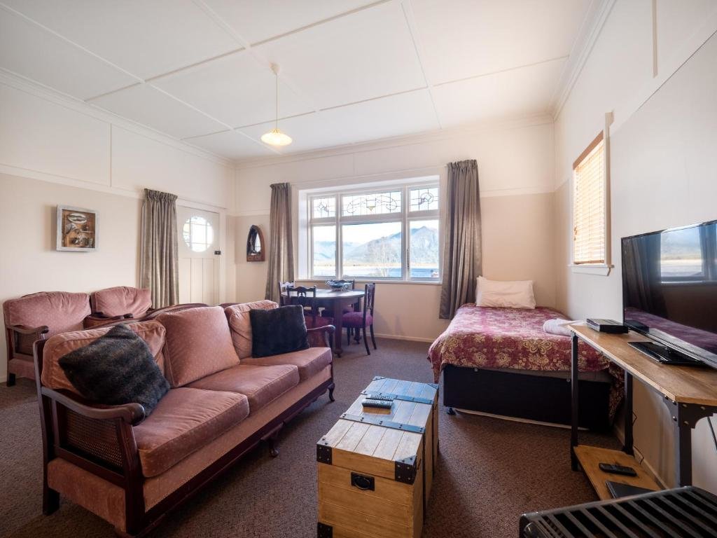 Suite 1 Schlafzimmer mit Seeblick Hotel Lake Brunner