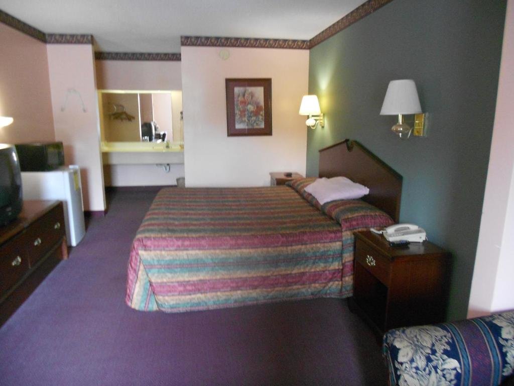 Standard Zimmer Executive Inn & Suites - Covington