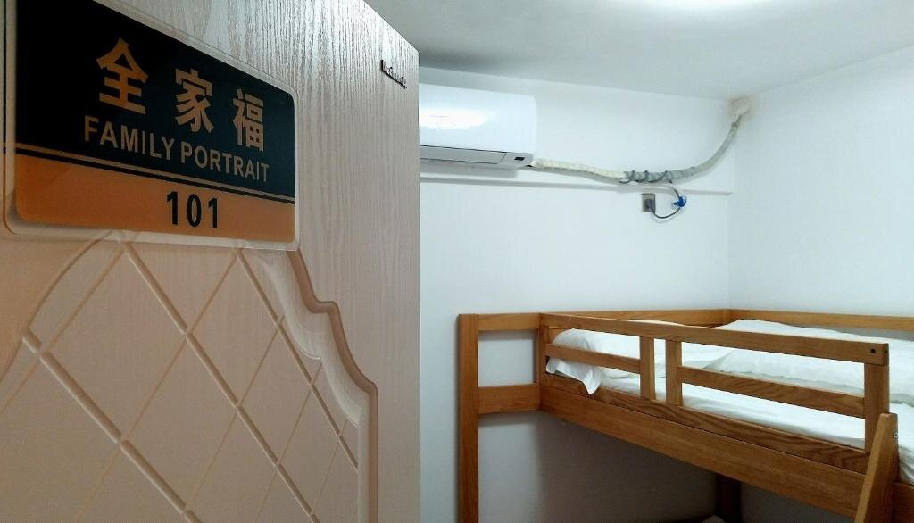 Habitación triple Confort Chongqing Zuji Youth Hostel