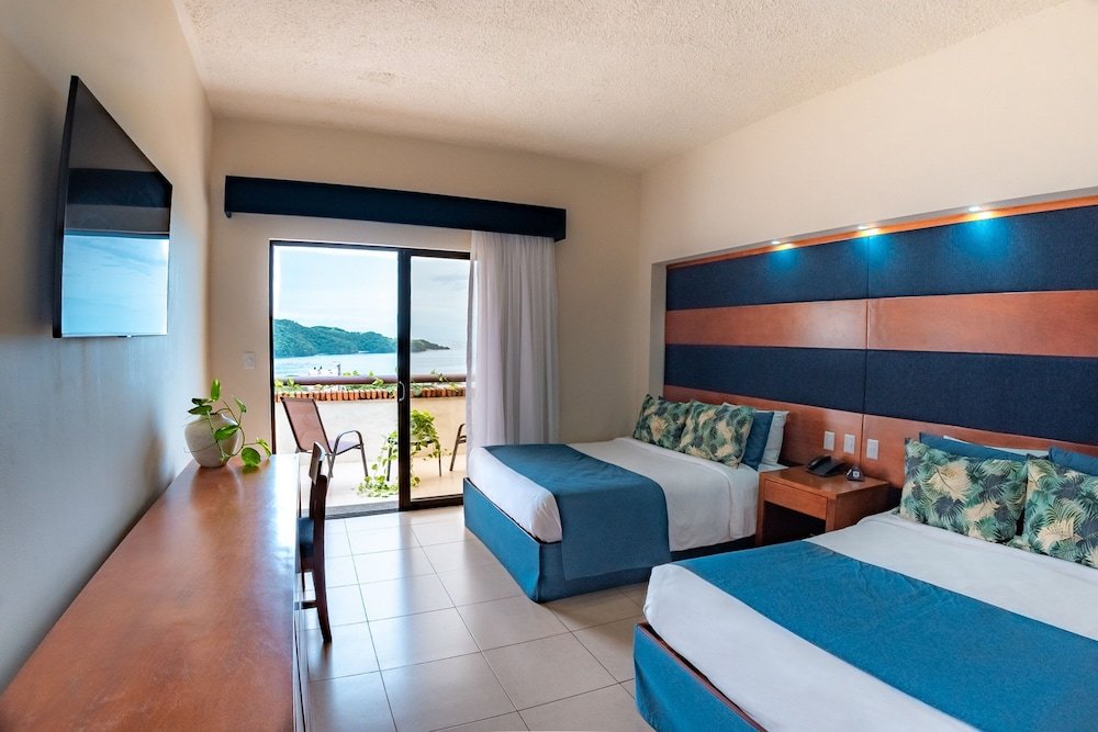 Habitación cuádruple De lujo con balcón Villas Sol Beach Resort