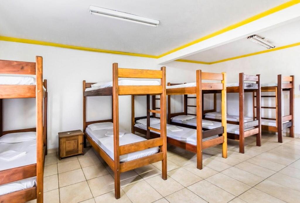 Кровать в общем номере Pousada Hebrom