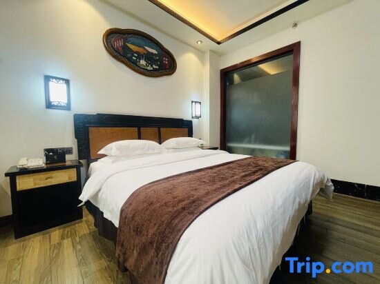Suite 1 camera da letto con vista sulle montagne Lichenghua Mansion All Suites Hotel