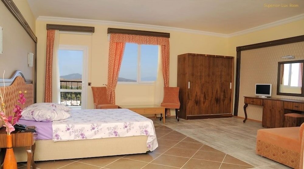 Standard famille chambre avec balcon Palm Garden Gumbet Hotel