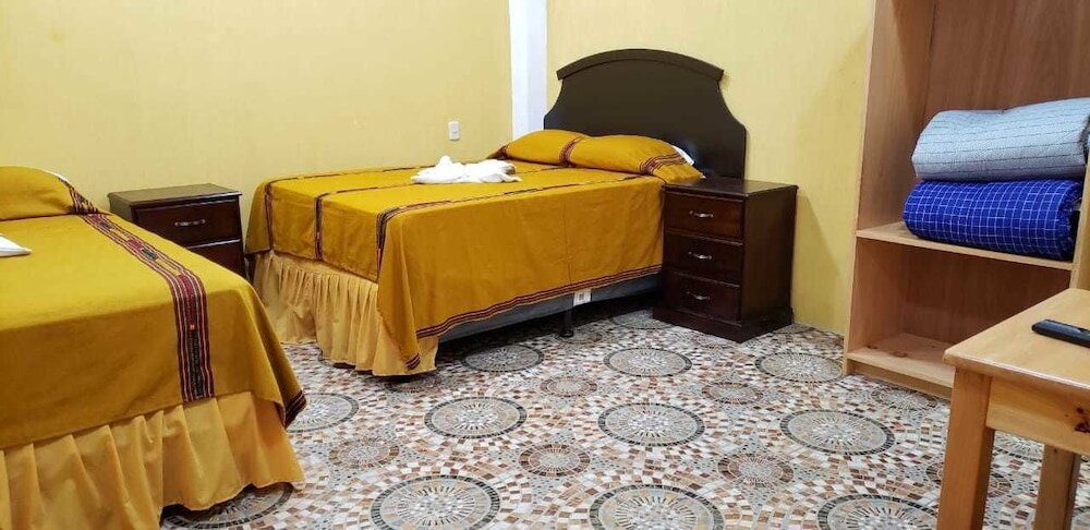 Кровать в общем номере Hotel jared