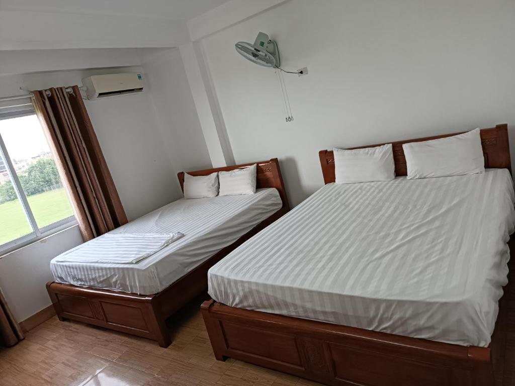 Standard Vierer Zimmer mit Gartenblick Anh Duong Hotel