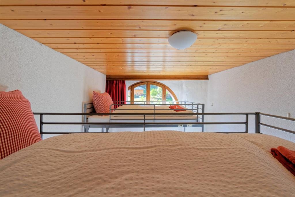 Кровать в общем номере Hôtel Terminus
