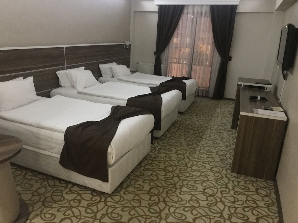 Standard triple chambre Perama Hotel