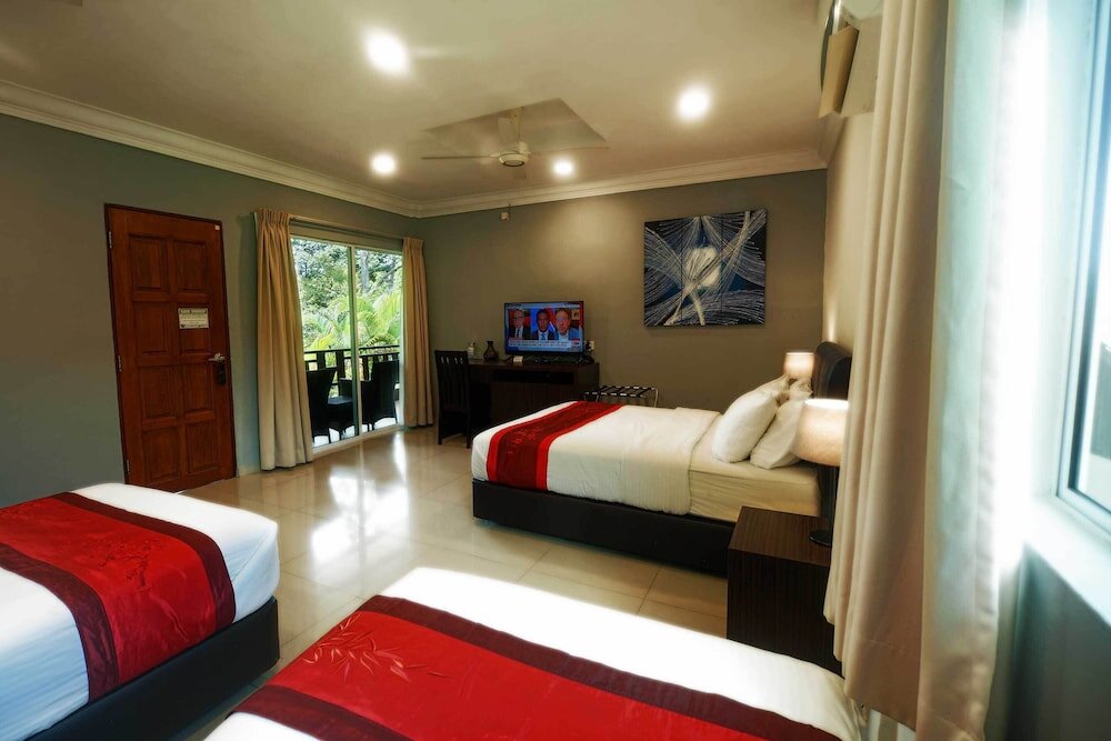 Habitación cuádruple De lujo con balcón Tioman Dive Resort