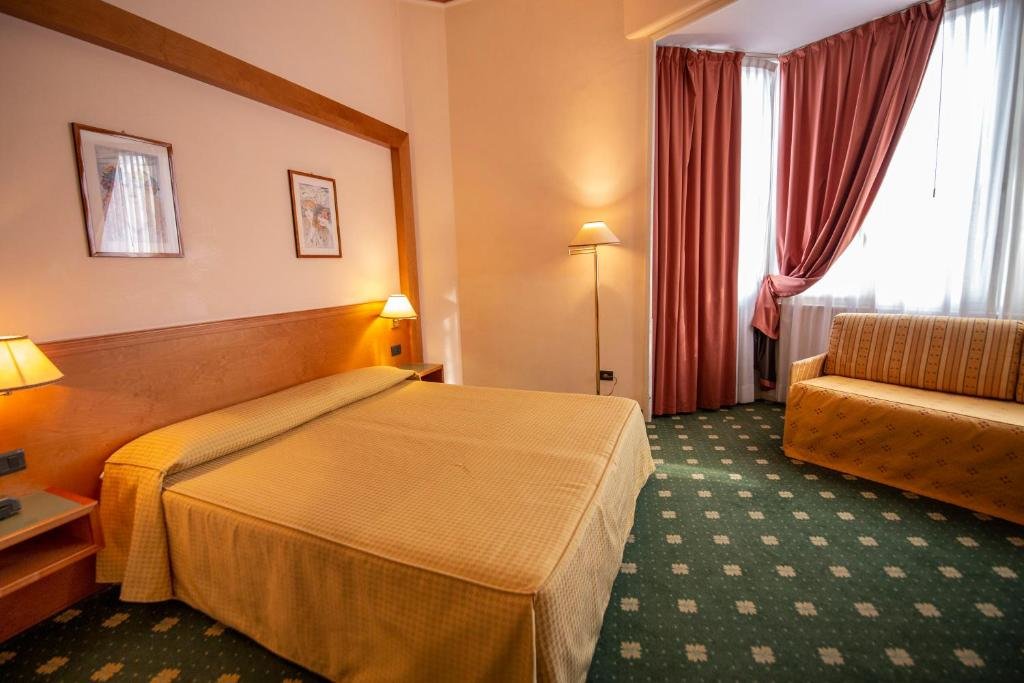 Standard quadruple chambre Hotel Estense