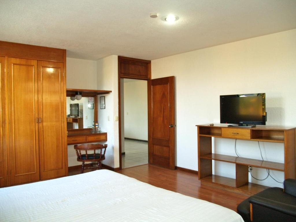 Junior suite Estanza Hotel & Suites