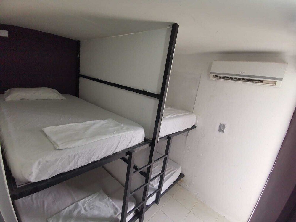 Кровать в общем номере Monasterio Hostel