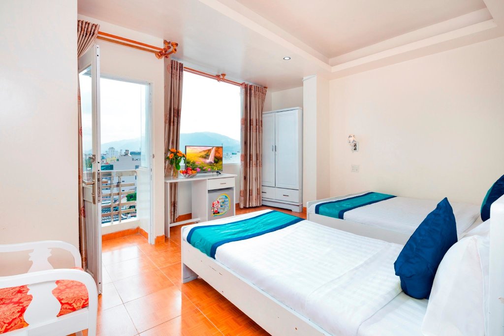 Deluxe Dreier Zimmer mit Balkon und mit Stadtblick Ken Nha Trang Hotel