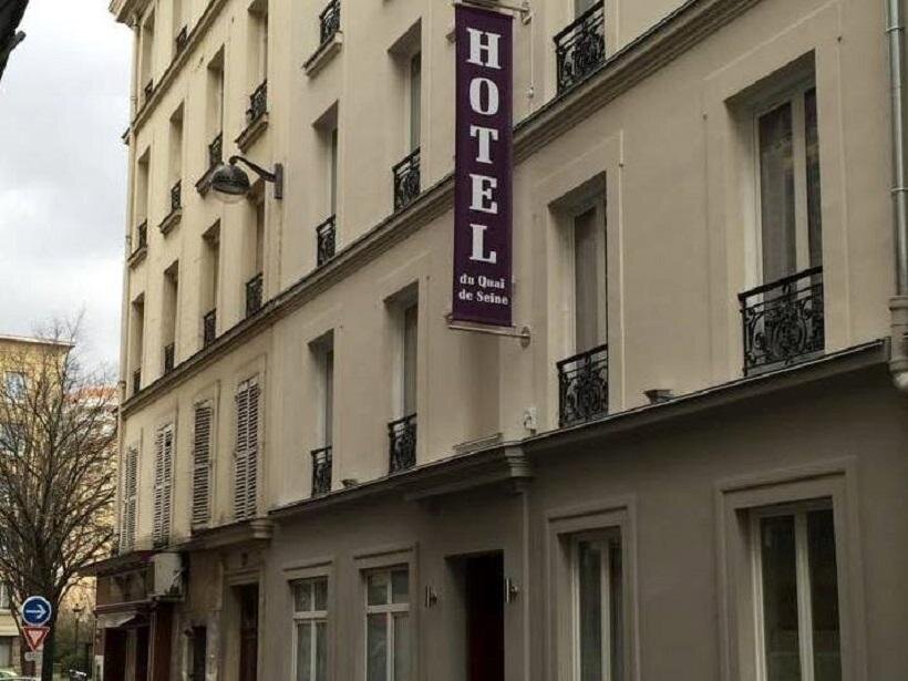 Кровать в общем номере Hôtel du Quai de Seine