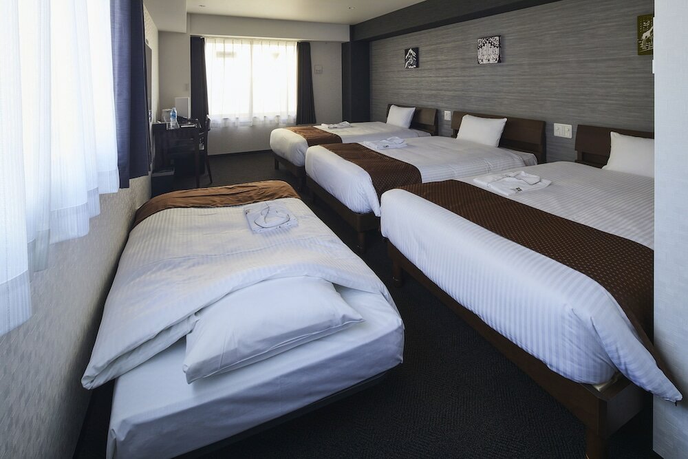 Standard Quadruple room Hotel Briller