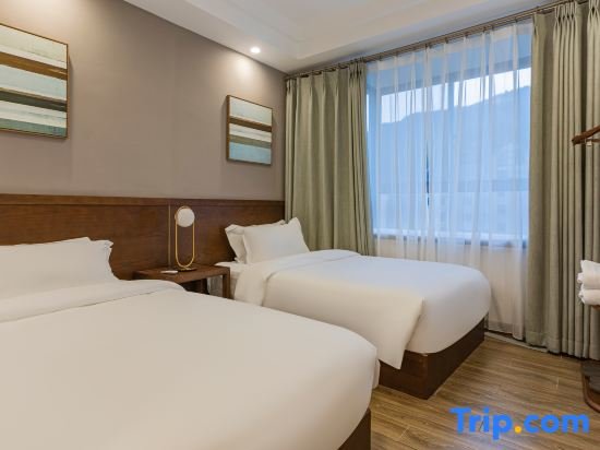 Suite 1 camera da letto Xiuhe Hot Spring Holiday Hotel