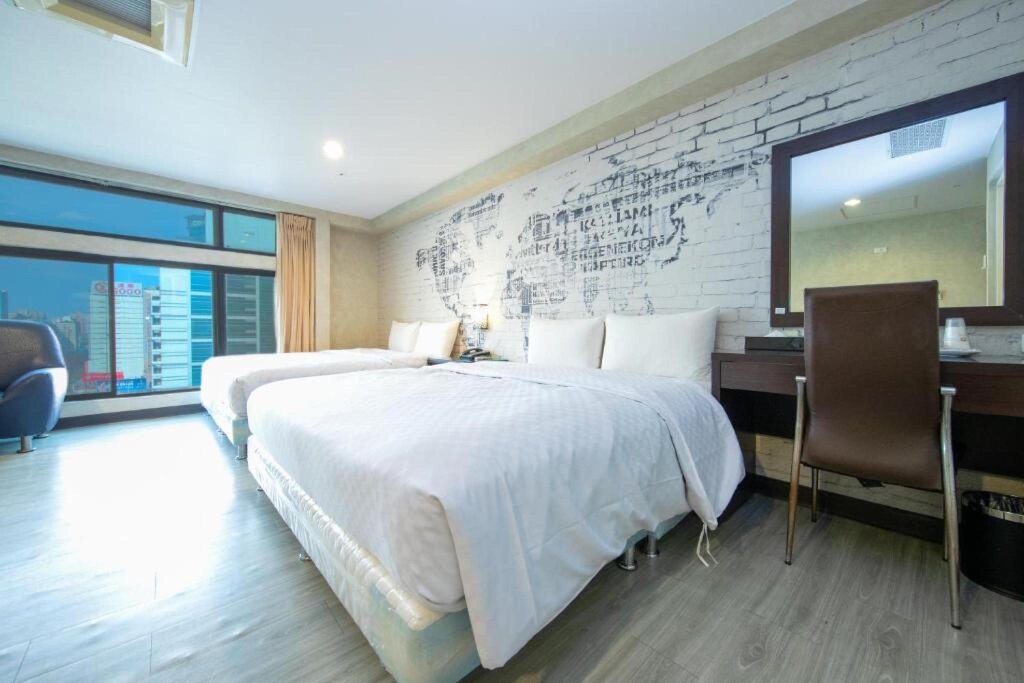 Standard quadruple chambre xin shi dai hotel