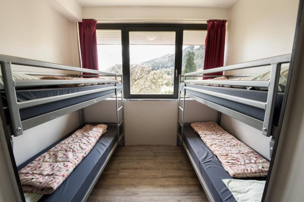 Кровать в общем номере Malmedy Youth Hostel