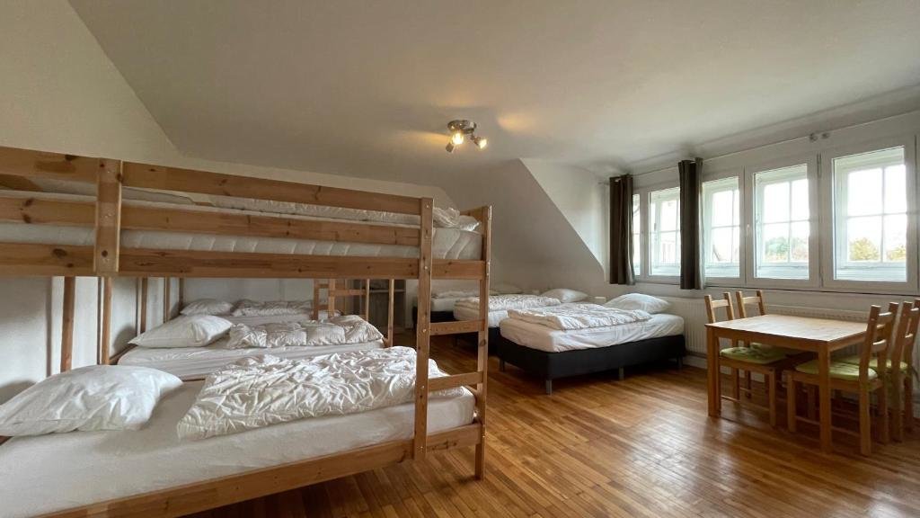 Кровать в общем номере Strumpffabrik