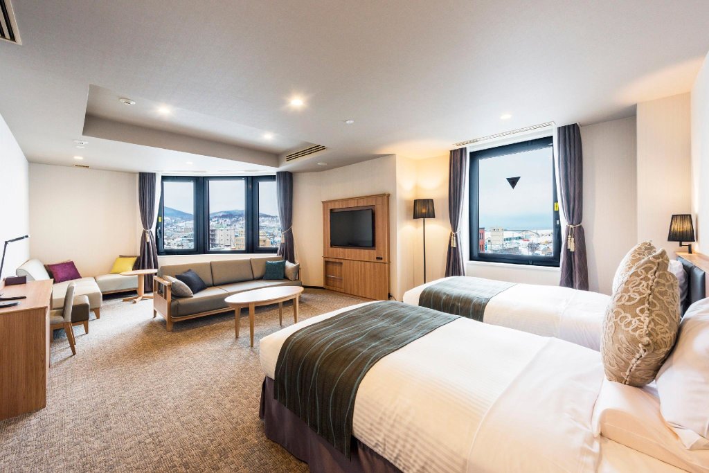 Кровать в общем номере Hotel Nord Otaru