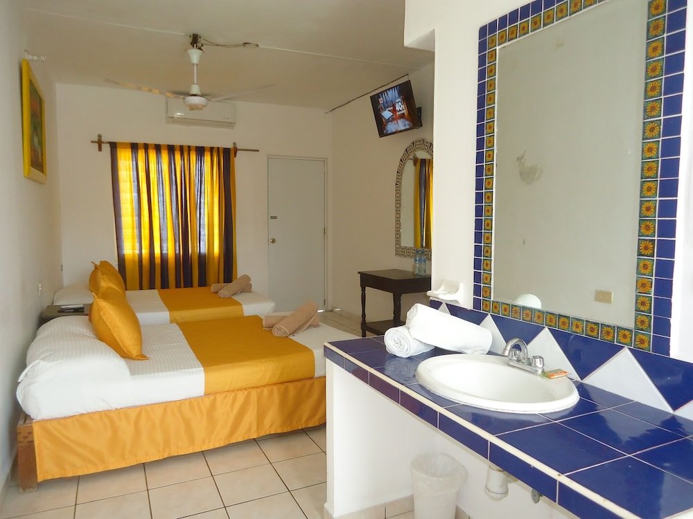 Deluxe Quadruple room with balcony and beachfront Hotel San Rafael Cuyutlan