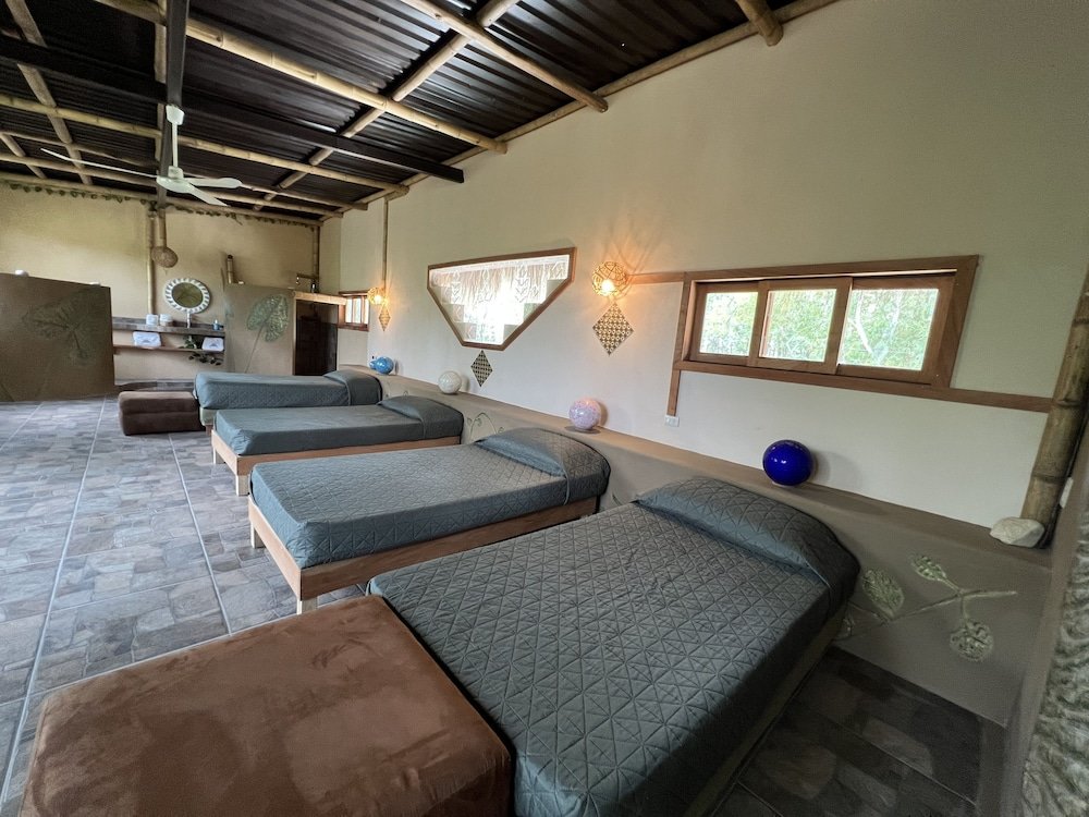 Кровать в общем номере Villas Adriana, Palenque