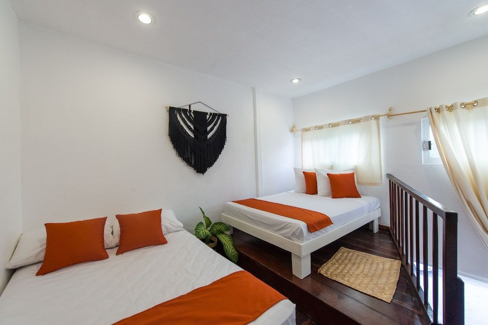 Standard quadruple chambre Hotel Caracol Puerto Morelos