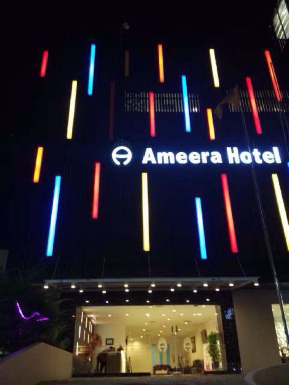 Кровать в общем номере Ameera Hotel