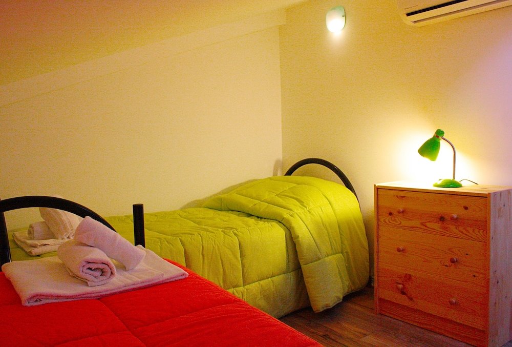 Bed in Dorm Attic In City-In