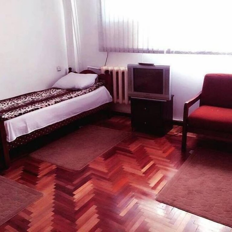 Кровать в общем номере Гостевой Дом Naftalan