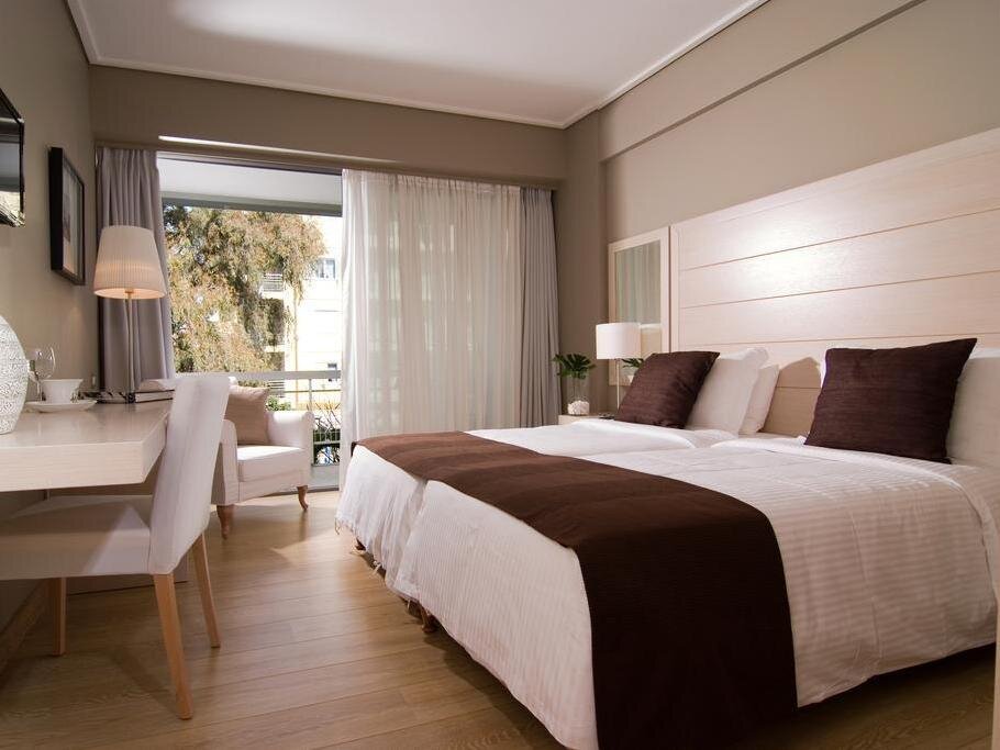 Кровать в общем номере Мансарда Sea View Hotel