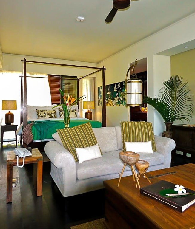 Suite con vista a la piscina Dhevatara Beach Hotel