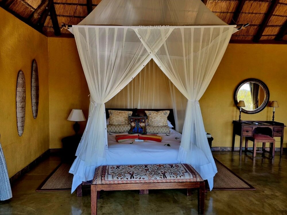 Luxus Doppel Zimmer 1 Schlafzimmer mit Blick auf den Park Motswiri Private Safari Lodge