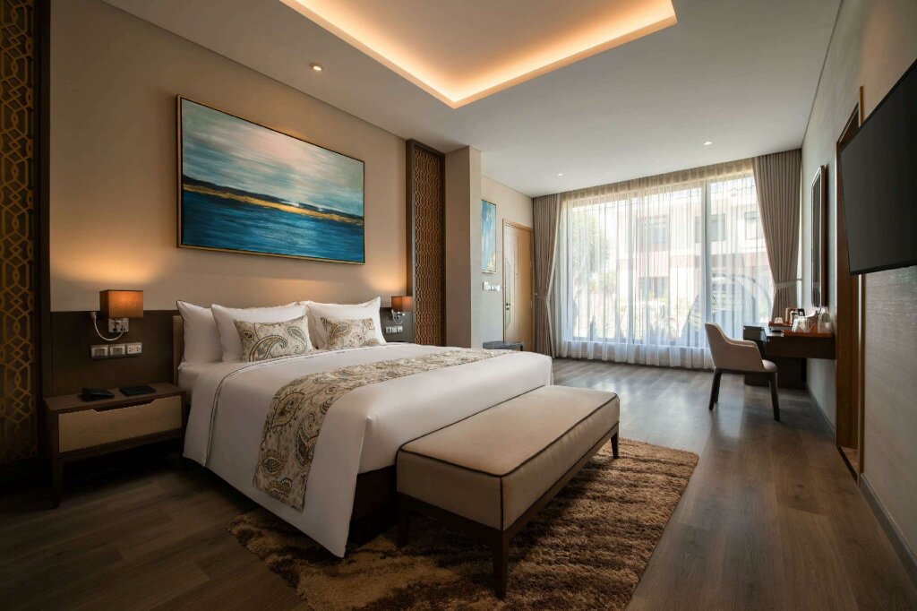 Deluxe room Wyndham Grand KN Paradise Cam Ranh