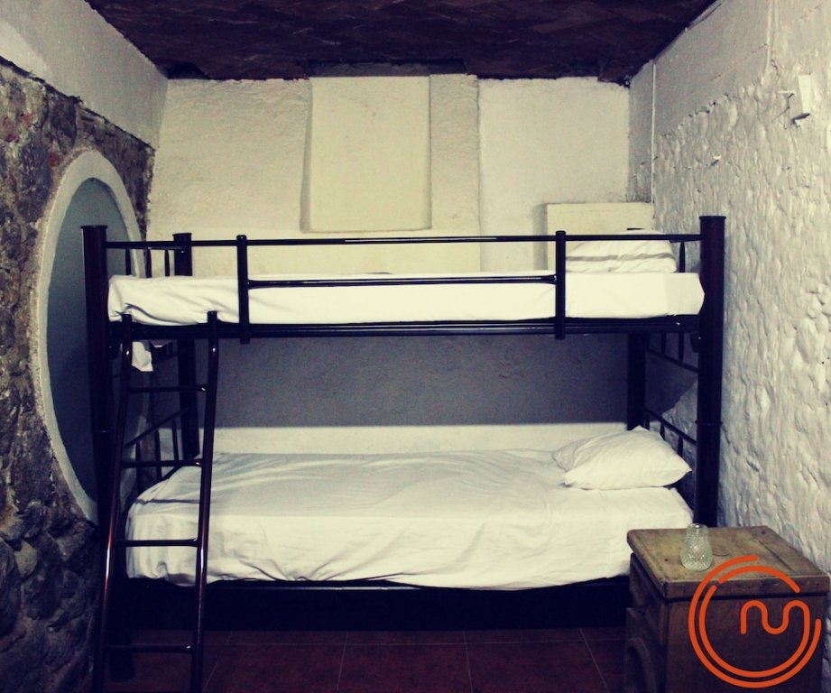 Кровать в общем номере Malli Hostel