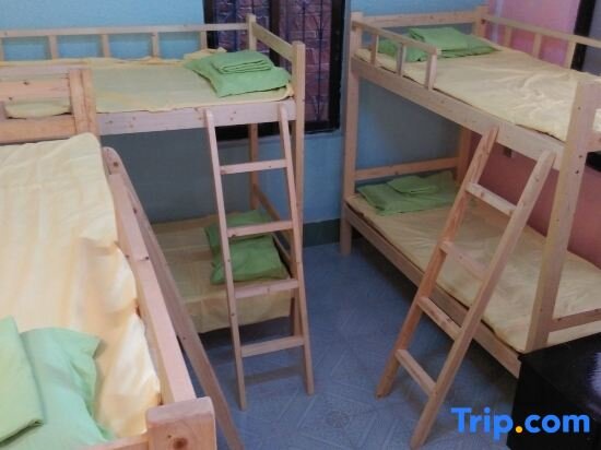 Кровать в общем номере Kwangchowan Hostel