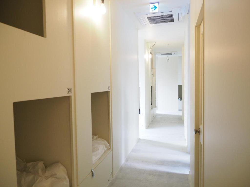 Cama en dormitorio compartido almond hostel & cafe Shibuya