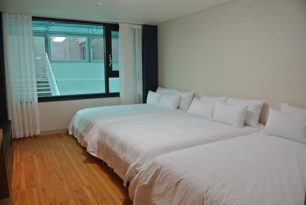 Standard Dreier Zimmer Jeju Noblesse Tourist Hotel