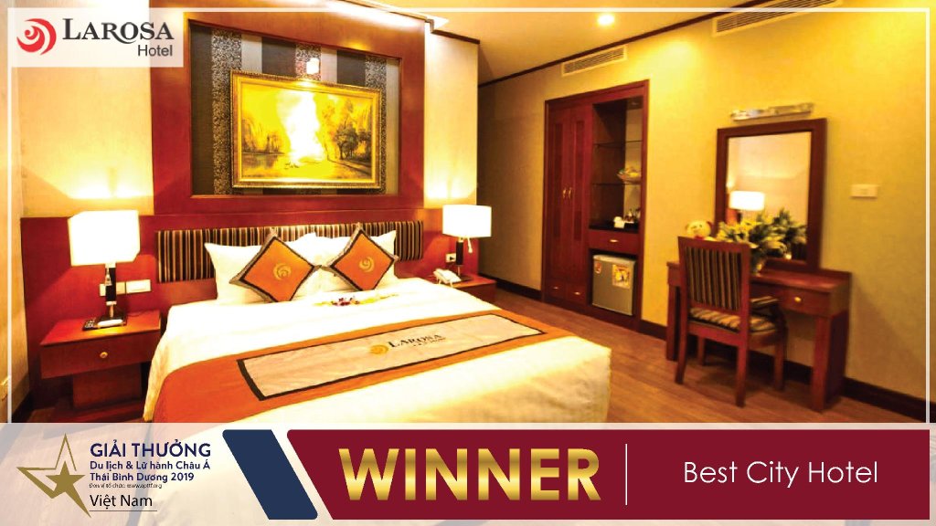 Кровать в общем номере Hanoi Larosa Hotel