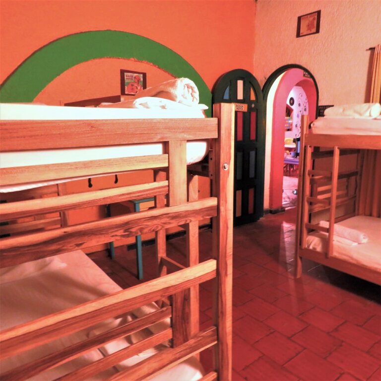 Кровать в общем номере Casa del Ritmo Hostel